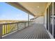 Large back deck provides ample space for outdoor enjoyment with fantastic views of the surrounding neighborhood at 14337 Shasta Daisy Pt, Parker, CO 80134