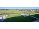 Artificial turf in a well maintained backyard, offering privacy and space for outdoor enjoyment at 14337 Shasta Daisy Pt, Parker, CO 80134