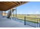 Outdoor space with stairs, a finished patio, and artificial turf at 14337 Shasta Daisy Pt, Parker, CO 80134