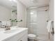 Modern bathroom with a glass-enclosed shower, sleek vanity, and neutral finishes for a clean look at 14337 Shasta Daisy Pt, Parker, CO 80134