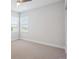 Bright bedroom featuring two windows, neutral carpet and white walls at 14337 Shasta Daisy Pt, Parker, CO 80134
