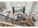 Stunning aerial view of the living room with large windows and a cozy fireplace at 14337 Shasta Daisy Pt, Parker, CO 80134
