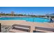 Community pool featuring lounge seating, clear water, and sun-soaked deck area at 14337 Shasta Daisy Pt, Parker, CO 80134