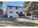 Two-story home with deck and fenced backyard at 3080 E Geddes Pl, Centennial, CO 80122