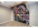 Basement with a large climbing wall for recreational activities at 3080 E Geddes Pl, Centennial, CO 80122