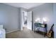 Charming bedroom with unique console table and guitar at 3080 E Geddes Pl, Centennial, CO 80122