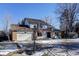 Two-story house with attached garage and basketball hoop at 3080 E Geddes Pl, Centennial, CO 80122