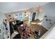 Open living room with a sectional sofa, colorful rug, and a view from above at 3080 E Geddes Pl, Centennial, CO 80122