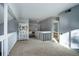 Upper hallway featuring neutral walls and carpet; leads to bedrooms and bathroom at 3080 E Geddes Pl, Centennial, CO 80122