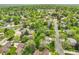 A neighborhood with mature trees and lush greenery at 11305 W 78Th Dr, Arvada, CO 80005
