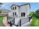 Home exterior features deck, large windows, and a manicured lawn. Welcome Home! at 2171 E 99Th Pl, Thornton, CO 80229