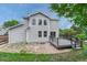 Exterior of home featuring deck, great landscaping, and gray siding at 2171 E 99Th Pl, Thornton, CO 80229