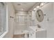 Small bathroom boasts tiled floors, vanity sink, and walk-in shower at 2171 E 99Th Pl, Thornton, CO 80229