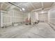 Spacious unfinished garage with concrete floor. Perfect for storage and projects at 2171 E 99Th Pl, Thornton, CO 80229