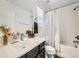 Well-lit bathroom features a vanity with modern fixtures and a shower-tub combination at 17265 E 110Th Ct, Commerce City, CO 80022