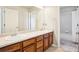 Bathroom with double vanity and bathtub at 5008 S Nepal St, Centennial, CO 80015