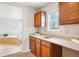 Bathroom with a large garden tub and built-in cabinets at 5008 S Nepal St, Centennial, CO 80015