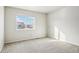 Spacious bedroom with carpeted floor and window at 5008 S Nepal St, Centennial, CO 80015