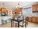 Bright dining area with wood table and chairs at 5008 S Nepal St, Centennial, CO 80015