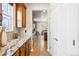 Kitchen boasts granite countertops and ample wood cabinetry at 5008 S Nepal St, Centennial, CO 80015