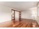 Spacious living room with hardwood floors and natural light at 1410 S Grant St, Longmont, CO 80501