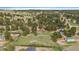 An aerial shot shows a single Gathering neighborhood with green lots, mature trees and a rural feel at 3337 Ponderosa Rd, Franktown, CO 80116