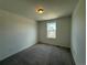 Cozy bedroom with natural light; perfect for relaxation and rest at 9041 Redfield Ln, Parker, CO 80134