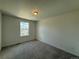 Bright bedroom with a window, perfect for relaxation and rest at 9041 Redfield Ln, Parker, CO 80134