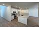 Bright kitchen with modern stainless steel appliances and a large center island at 9041 Redfield Ln, Parker, CO 80134