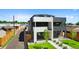Stunning elevation showcases modern design, a well-kept yard, and beautiful landscaping at 1953 W 47Th Ave, Denver, CO 80211