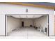 Spacious, unfinished garage with ample storage, high ceilings, and a large open layout at 1953 W 47Th Ave, Denver, CO 80211