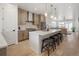 Open kitchen design with an island, stainless steel appliances, modern cabinets, and pendant lighting at 1953 W 47Th Ave, Denver, CO 80211