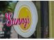 A close up of the Sunny's logo on their storefront window at 1953 W 47Th Ave, Denver, CO 80211