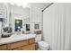 Clean bathroom with a shower/tub combo and updated vanity at 20242 E Lasalle Pl, Aurora, CO 80013