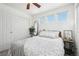 Well-lit bedroom with ample closet space and a ceiling fan at 20242 E Lasalle Pl, Aurora, CO 80013