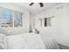 Relaxing bedroom featuring a window and wall decor at 20242 E Lasalle Pl, Aurora, CO 80013