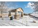 Community park gazebo with picnic tables, covered and snow-covered ground at 20242 E Lasalle Pl, Aurora, CO 80013