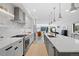 Gourmet kitchen featuring an island, modern finishes, and an open layout at 3409 Navajo St, Denver, CO 80211