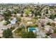Community shot featuring pool, tennis courts, and neighborhood landscaping at 6389 S Monaco Ct, Centennial, CO 80111