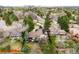 Bird's eye view of the home showcasing the solar panels, deck, and fenced backyard at 6389 S Monaco Ct, Centennial, CO 80111