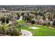 Scenic aerial view of the neighborhood featuring a playground and green spaces at 6389 S Monaco Ct, Centennial, CO 80111