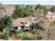 Aerial view of the home highlighting the spacious backyard, two decks, and landscaping at 6389 S Monaco Ct, Centennial, CO 80111