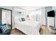 Inviting bedroom with soft blue walls, natural light, and plenty of closet space at 6389 S Monaco Ct, Centennial, CO 80111