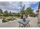 Outdoor living on a tiered wood deck with patio furniture, a built-in grill, and backyard views at 4205 E 106Th Pl, Thornton, CO 80233