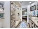 Bathroom featuring a glass-enclosed shower and vanity with a wood-look countertop at 4205 E 106Th Pl, Thornton, CO 80233