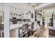 Stylish kitchen with granite countertops, stainless steel appliances, and breakfast bar seating at 4205 E 106Th Pl, Thornton, CO 80233