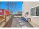 Gravel backyard featuring stepping stones, a shed, and modern outdoor storage at 853 Mockingbird St, Brighton, CO 80601