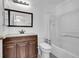 Standard bathroom featuring a vanity with a dark wood cabinet at 853 Mockingbird St, Brighton, CO 80601