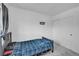 Bedroom featuring carpet and a closet at 853 Mockingbird St, Brighton, CO 80601