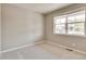 Bright bedroom with neutral walls and carpet flooring at 18359 Field Mint Pt, Parker, CO 80134